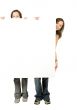 twin sisters holding a white banner
