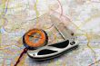 Compass and knife on a map