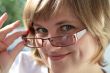 a nice portrait of young woman with glasses
