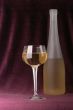 Glass and bottle of white wine