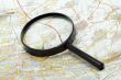 Handglass on a map