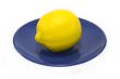 Lemon served on a blue plate