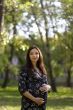 Pregnant woman in park #1