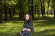 Pregnant woman in park #2