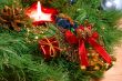Xmas wreath with a candle and bells