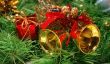 Golden bells against Xmas tree branch