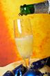 Pouring champagne on glass