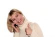 Smiling girl with mobile phone with good idea gesture