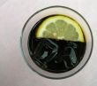 Glass of cola with citron