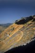 Greek theatre built into steep mountain slope