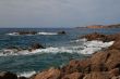 Rocks by the heavy sea