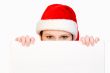 Christmas girl holding up a white sign