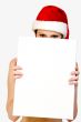 Christmas girl holding up a white sign