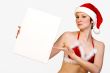 Christmas girl holding up a white sign