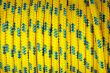 Heap of yellow and blue plastic ropes
