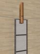 Film hanging on a cord. 3D image.