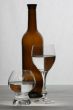 brown bottle and glasses