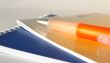  two notebooks and orange pen