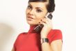 Atractive brunet businesswoman with phone