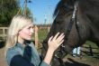 Blond female model with brown horse portrait