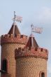 Castle Towers with Feathers Upon Blue Sky