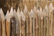 wooden sharp logs palings barrier wall