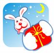 cheerful rabbit and gift