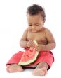 Baby eating watermelon