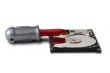 The disassembled hard disk with a toy screw-driver isolated on w