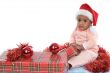 baby girl with christmas presents