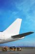 airplain tale and luggage cart