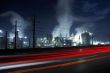Cars passing by at oil refinery