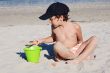 boy playing in the beach