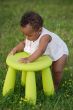 Toddler playing with chair