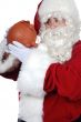 Santa Claus with a pig money box