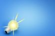Background with lit lightbulb