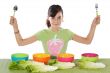 girl with colourful bowls