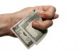 dollars in a hand