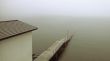 old pier in mist