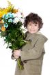 adorable boy with flowers