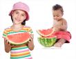 baby and girl eating watermelon