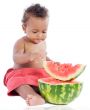 Baby eating watermelon