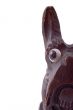 The head of wooden toy dog. Half view
