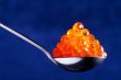 Red caviar in the spoon