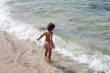 boy playing in the beach