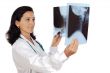 doctor examining a radiographs