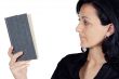 young woman reading a book