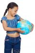 Girl with a globe of the world