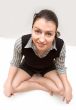 business lady sits on a floor