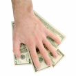 hand takes dollars